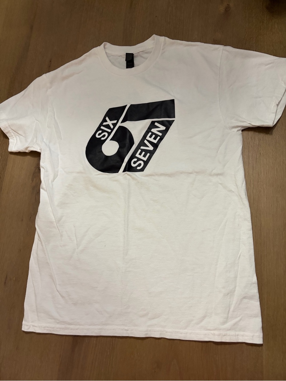 Women’s White Graphic Tee with the 6/7 trend
